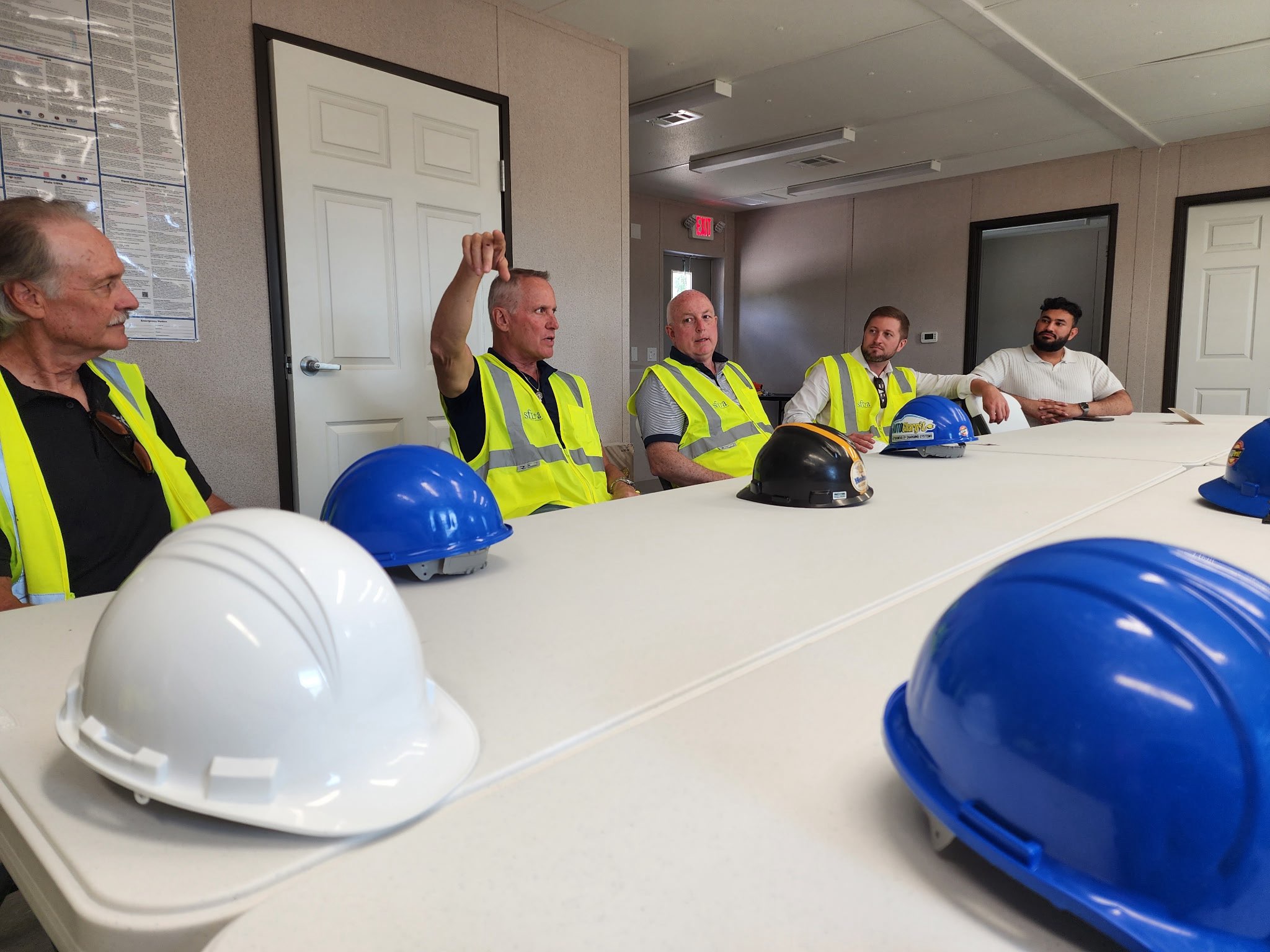 Christopher Alan speaks to entire team during the City Gateway Tour